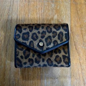 A New Day, fuzzy leopard wallet